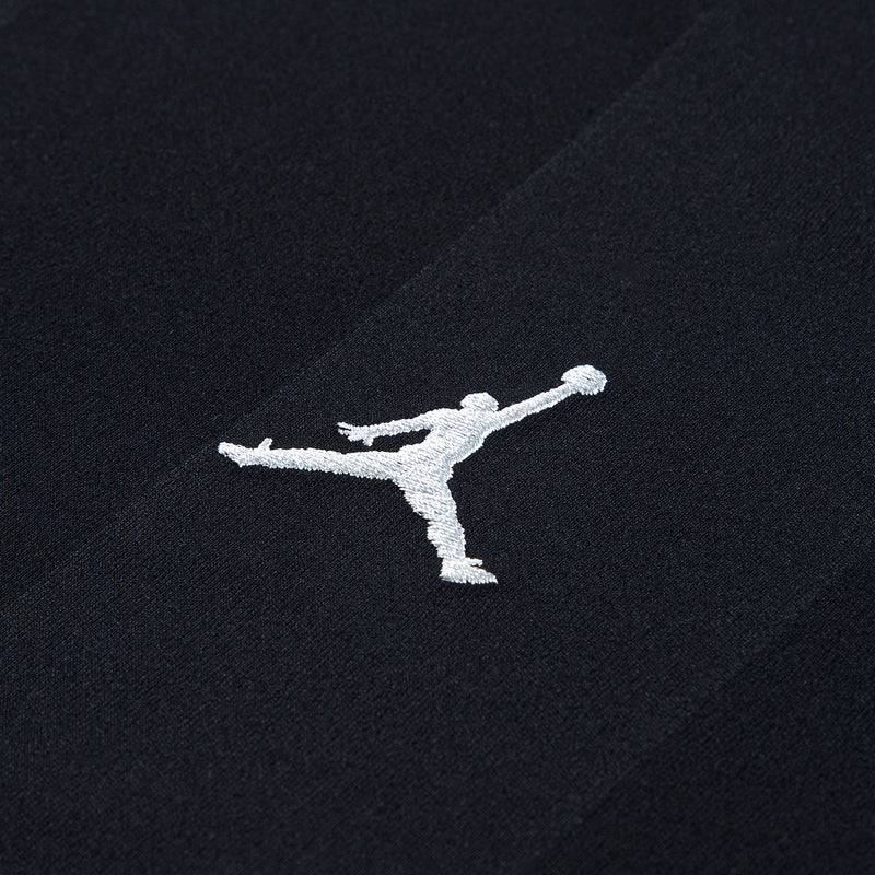Black youth jersey with white Jumpman logo graphic