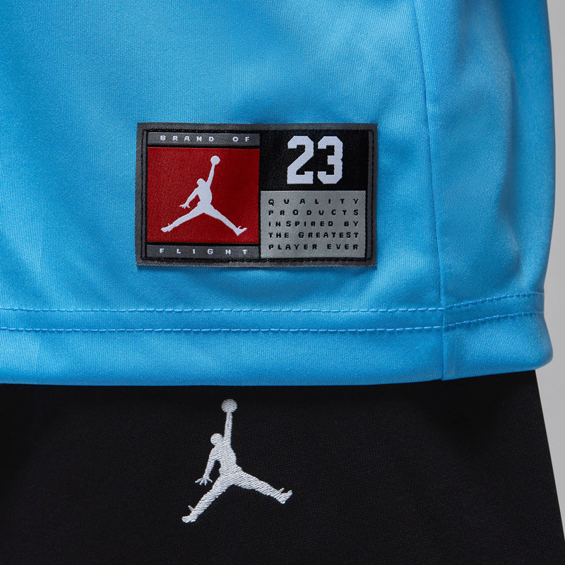 Youth light blue basketball jersey, black-red quality patch on chest