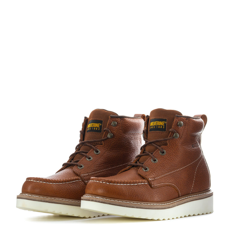 Pair of men's brown moc-toe lace-up boots, front view with contrast sole