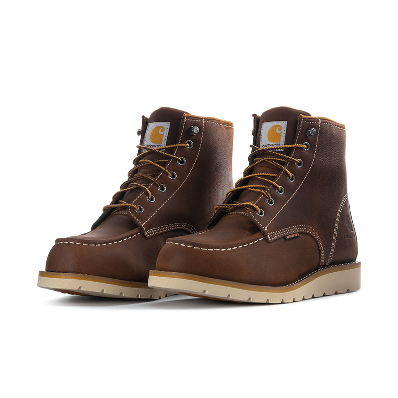 Pair of men's dark brown lace-up moc toe work boots with padded collars and tan soles