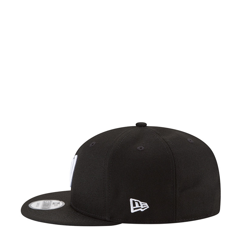 Black baseball cap with New Era side logo and curved brim