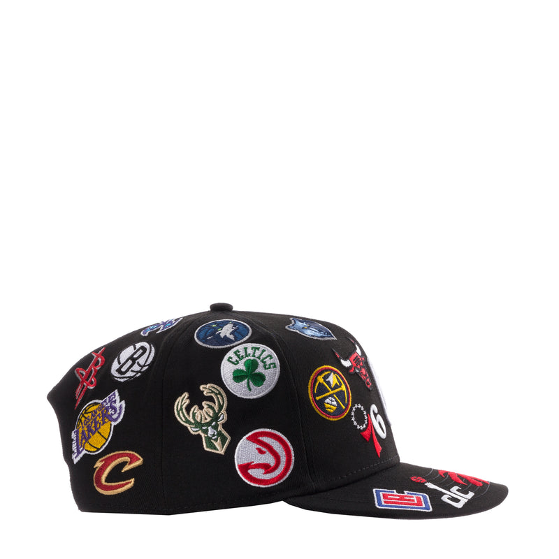 Black snapback cap with assorted embroidered NBA team logos on the front panel