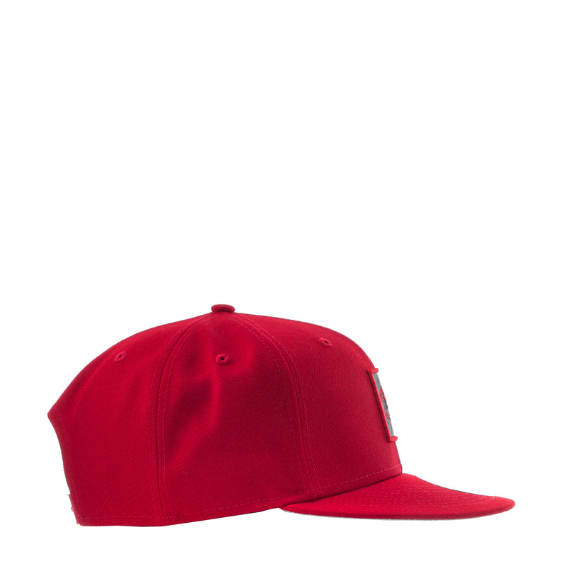 Red baseball cap angled view with small side logo detail
