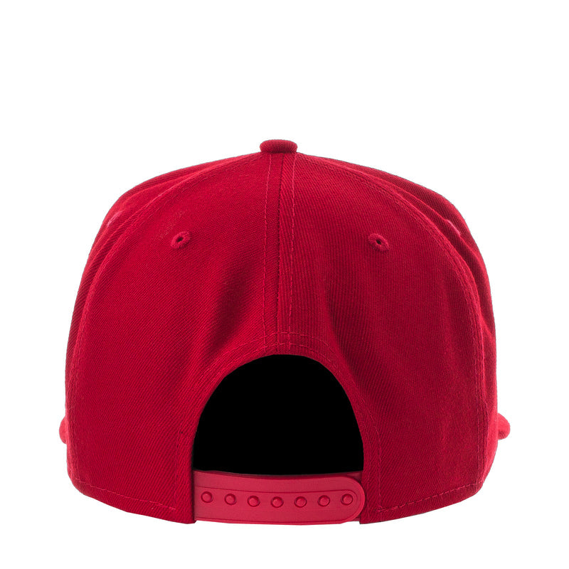 Red baseball cap back view with adjustable strap and dark interior