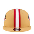 Gold baseball cap with red and white vertical stripe, embroidered logo patch