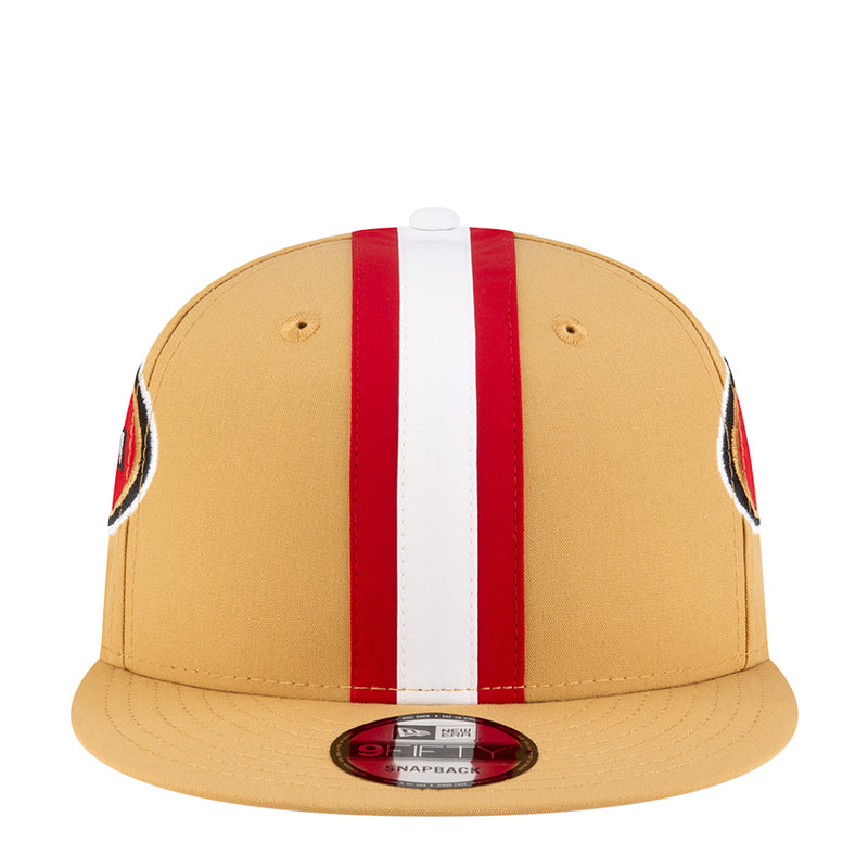 Gold baseball cap with red and white vertical stripe, embroidered logo patch
