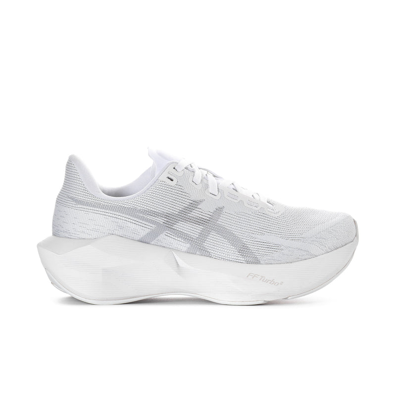 Women's white lace-up running shoes with textured knit upper and cushioned sole