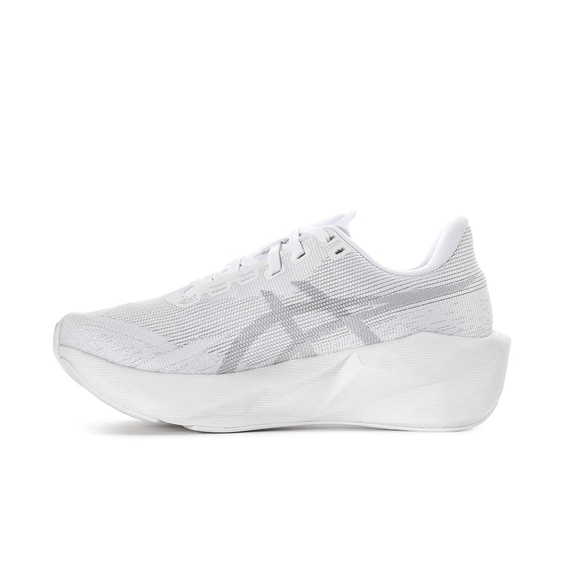 Women's white lace-up running shoes, angled side view with knit texture and midsole