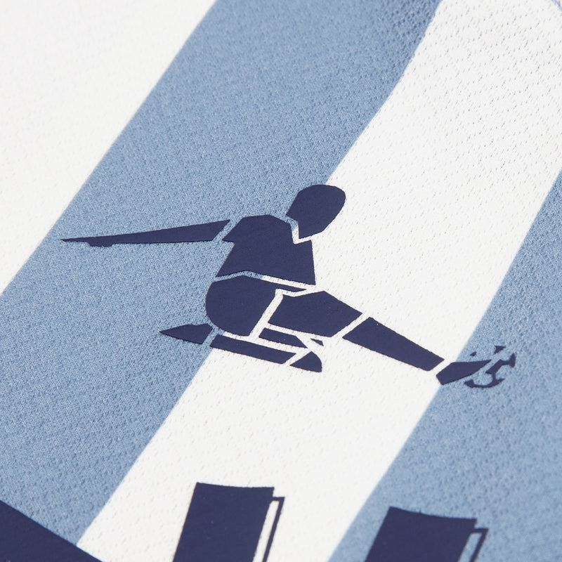 Light blue striped kids jersey with football player graphic applique