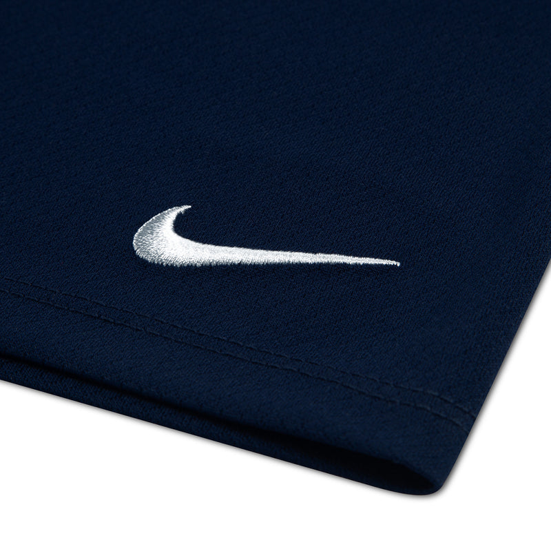 Navy shorts with white Nike swoosh logo on the leg