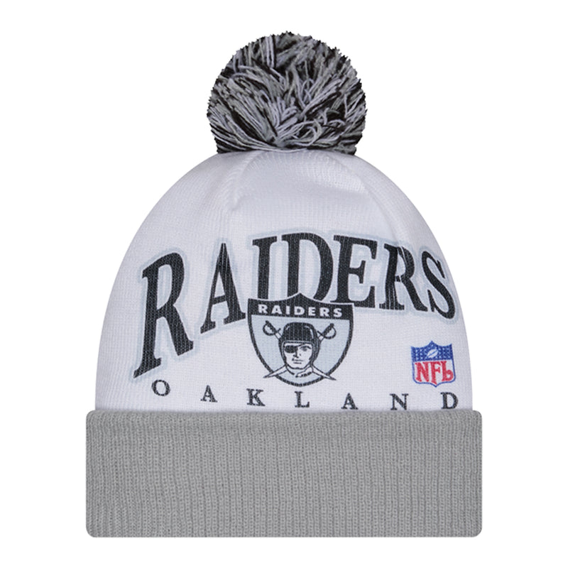 White and gray knit beanie with dark pom and Raiders graphic on front
