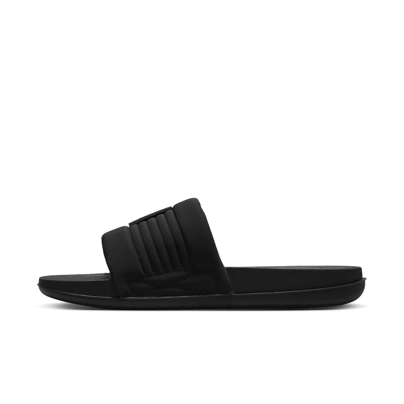 Black slide sandals with ribbed strap and cushioned outsole