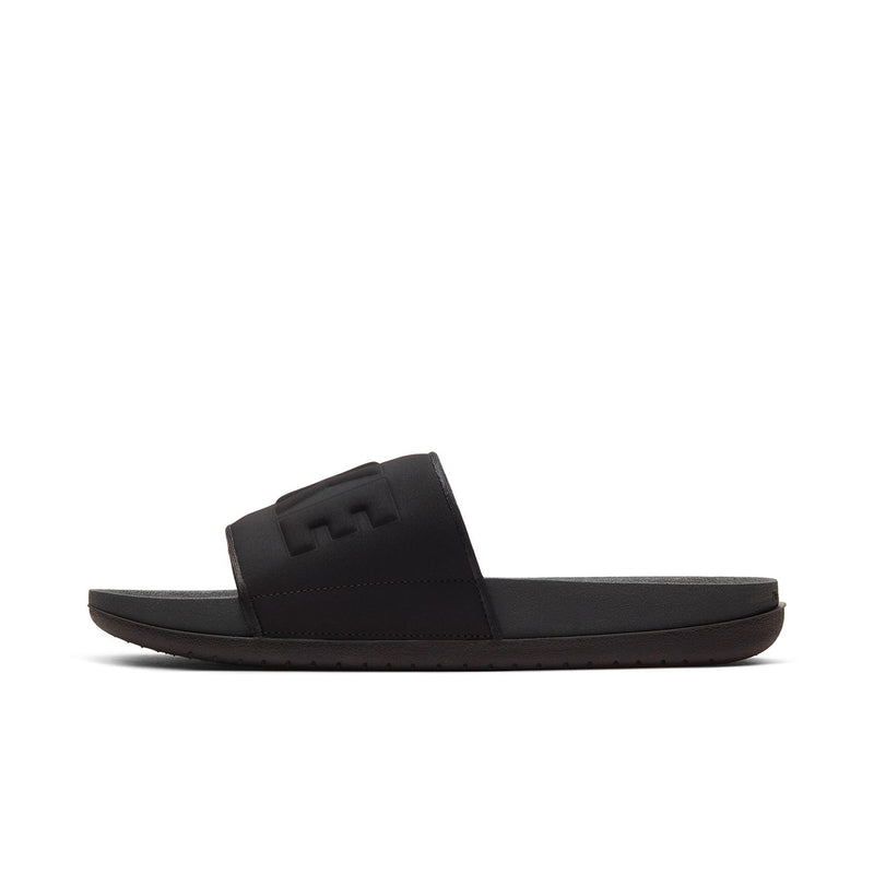 Men's slide sandals, side view with black single strap and cushioned sole