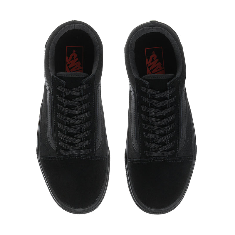 Men's black sneaker tongue and lace area with padded interior collar
