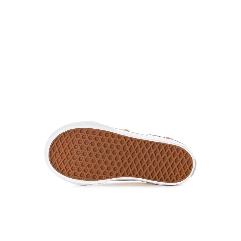 Toddler low-top sneaker outsole with textured brown rubber tread and white edge