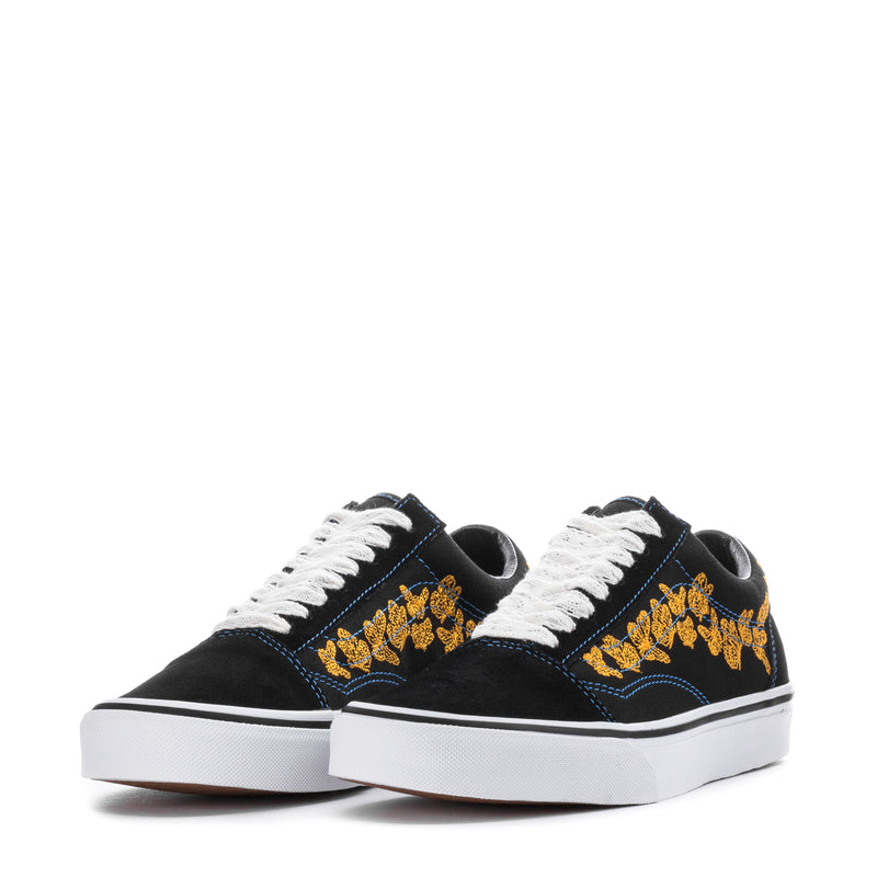 Women's low-top sneakers, black with yellow embroidered pattern, white laces, low profile