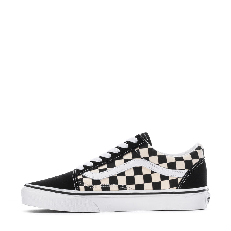 Youth checkerboard skate sneakers with black paneling, white trim, and white rubber sole