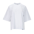 Oversized white women's tee with crew neck and short sleeves, front view