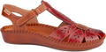 Red sandal with cut-out design on a white background