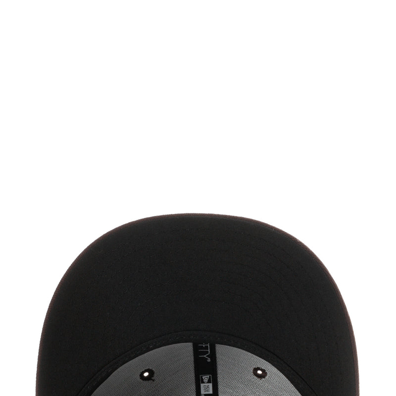Black baseball cap sweatband close-up with gray inner band