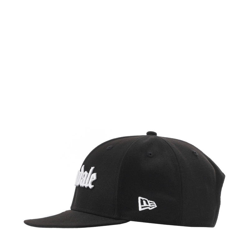 Black baseball cap with white script logo and New Era emblem on the side