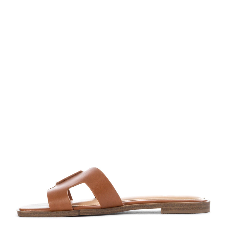 Cognac slide sandal with wide H strap and flat sole