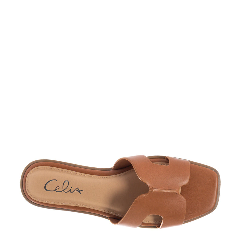 Cognac slide sandal with open toe, H strap, and Celix logo insole