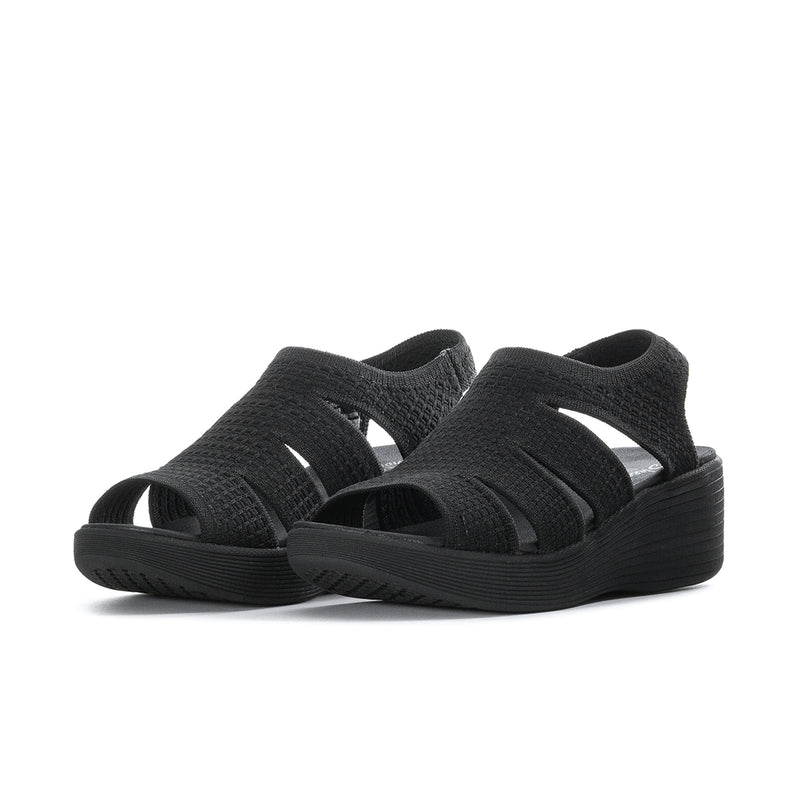 Black women's slingback platform sandal, side view with wide hook-and-loop straps