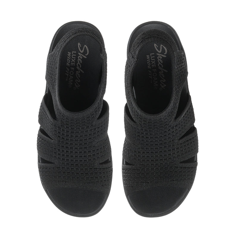 Black women's slingback platform sandals, back view with heel cup and knit footbed