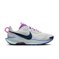 Women's trail running shoe, light gray with navy swoosh and purple laces