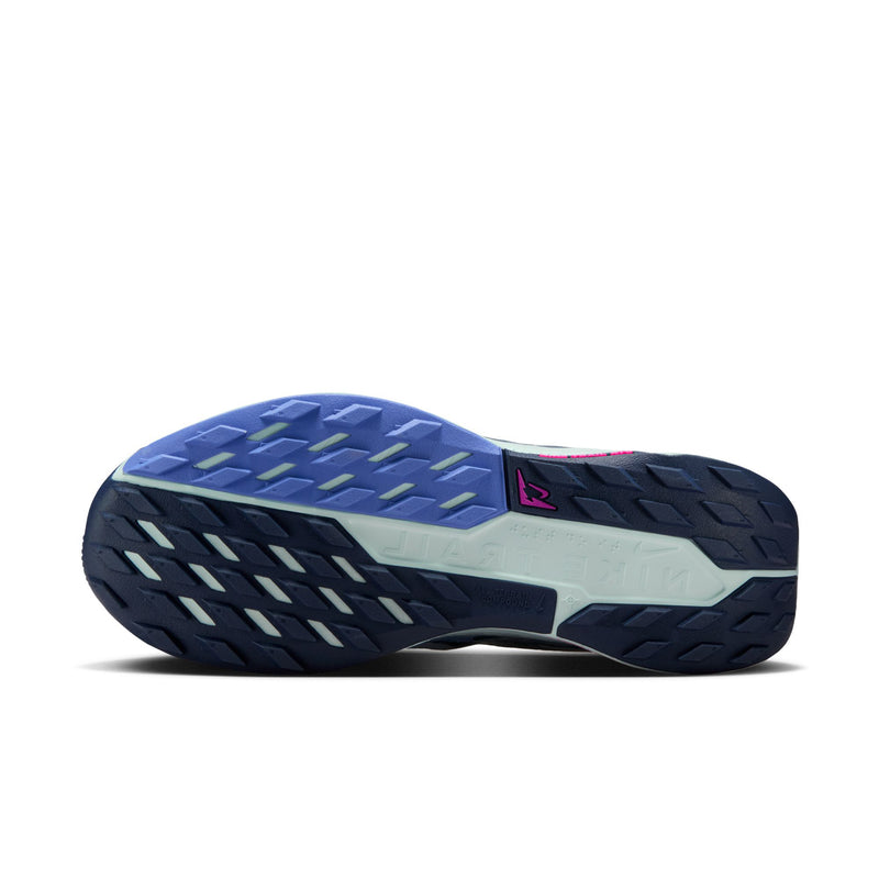 Women's trail shoe outsole, blue and dark tread with patterned grip