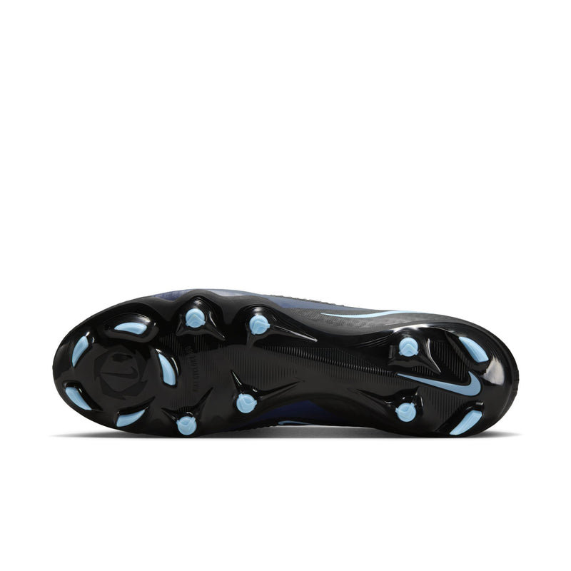 Outsole view of black soccer cleat with light blue studs on firm-ground plate