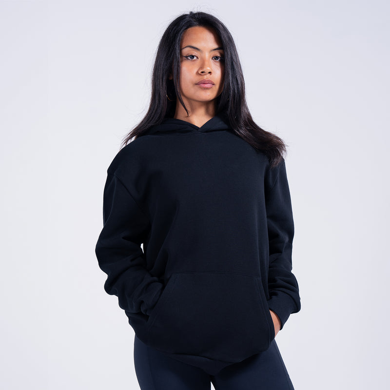 Women's black fleece pullover hoodie, front view with hood and kangaroo pocket