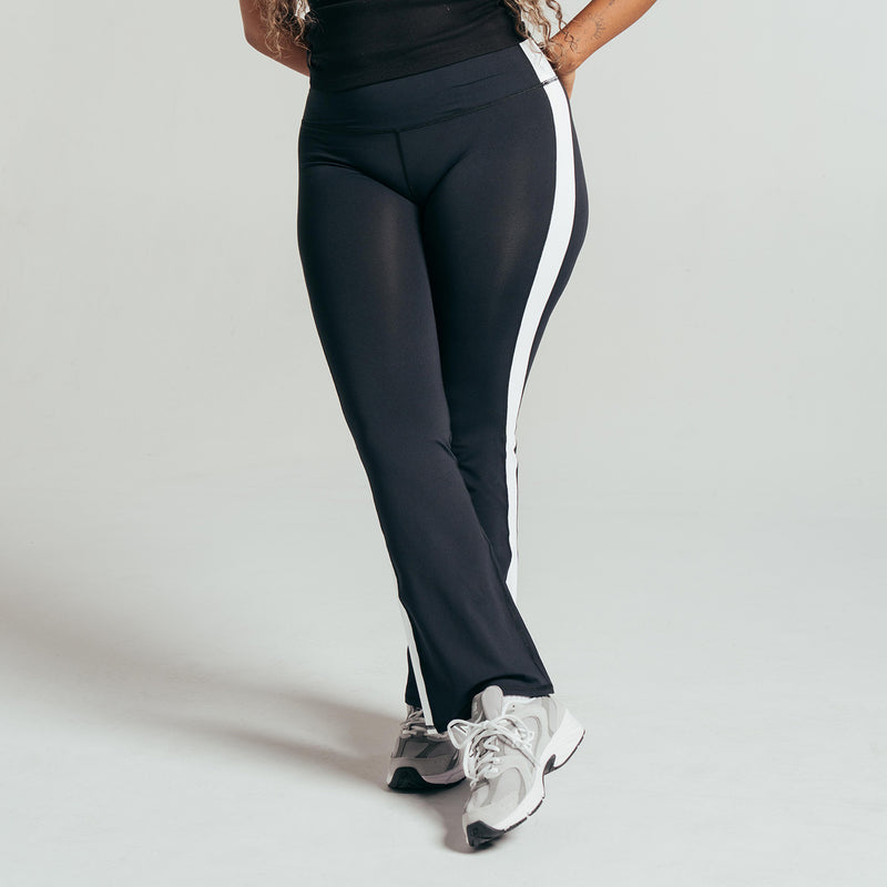 Black flare leggings with white side panel and athletic fit