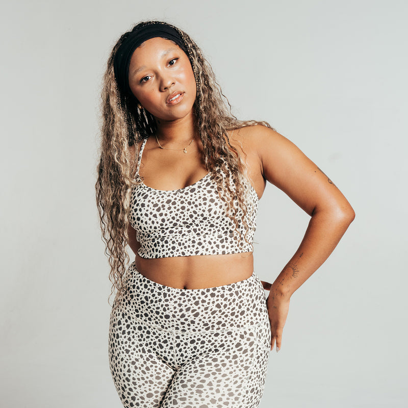 Power sports bra for women in animal dot print, cropped fit with scoop neckline