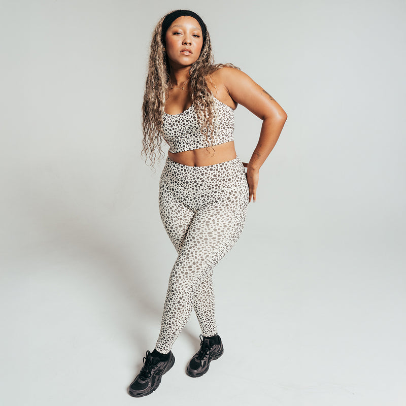 Power sports bra for women in animal dot print, cropped style with scoop neckline