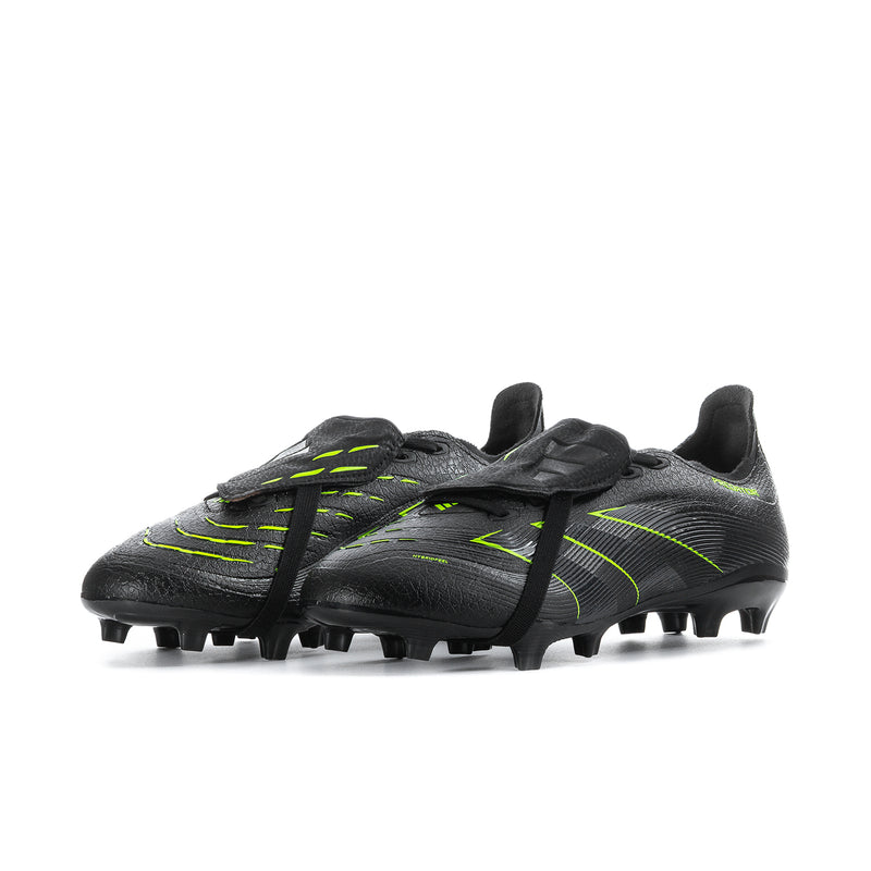 Men's black football cleats with neon green synthetic upper and molded stud sole