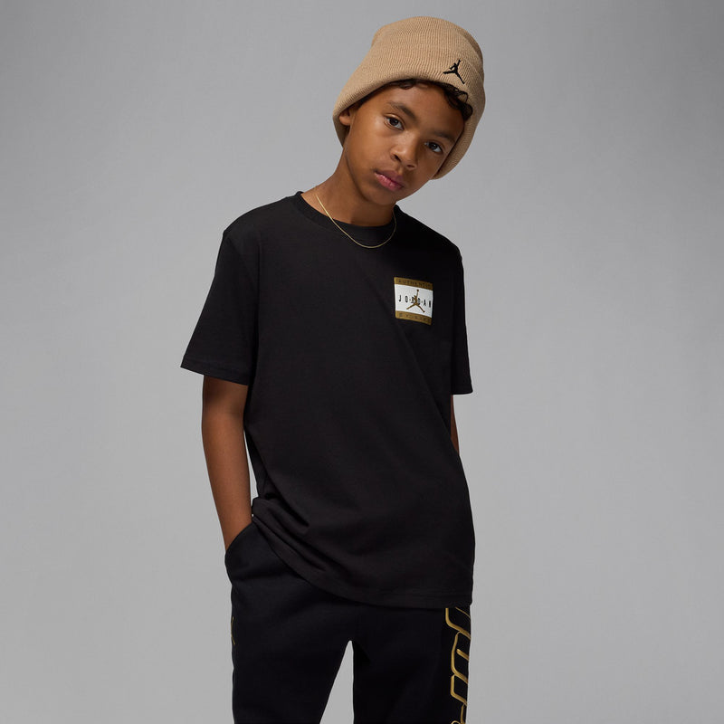 Youth black crewneck tee with square chest patch graphic