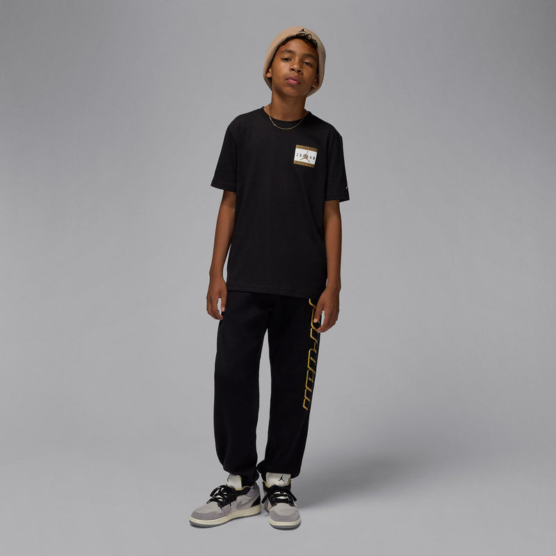 Youth black tee with square chest patch graphic