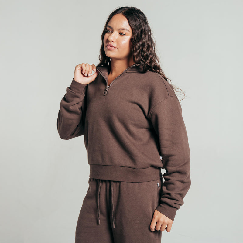 Chocolate brown women's fleece half-zip pullover with long sleeves