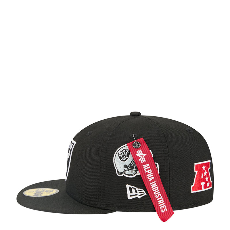Black baseball cap with red tag and side patch graphics