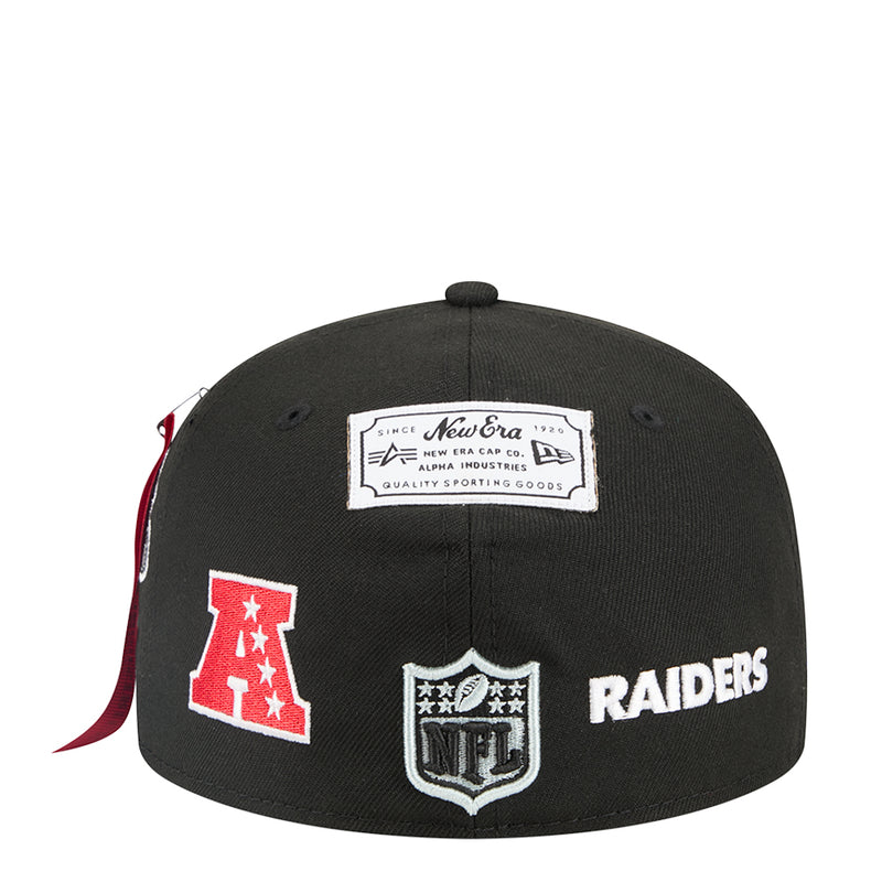 Black baseball cap back with New Era label and Raiders wordmark patch