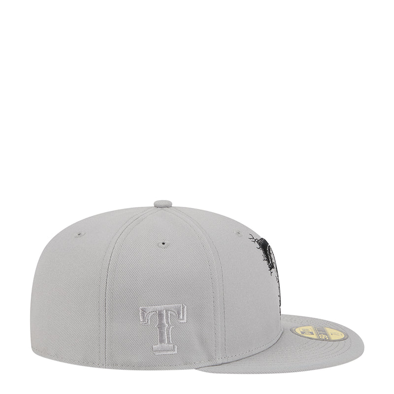 Grey baseball cap side view with small outlined “T” logo and flat brim