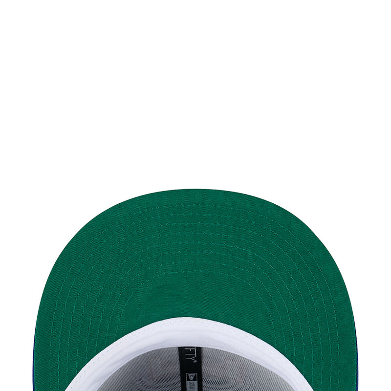 Dark green baseball cap with white inner brim lining