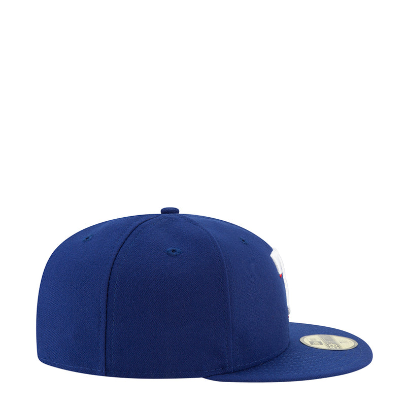 Royal blue baseball cap side view with no front graphic visible