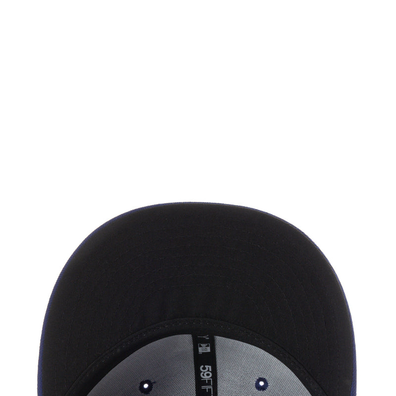 Black baseball cap close-up with gray inner panel and eyelets