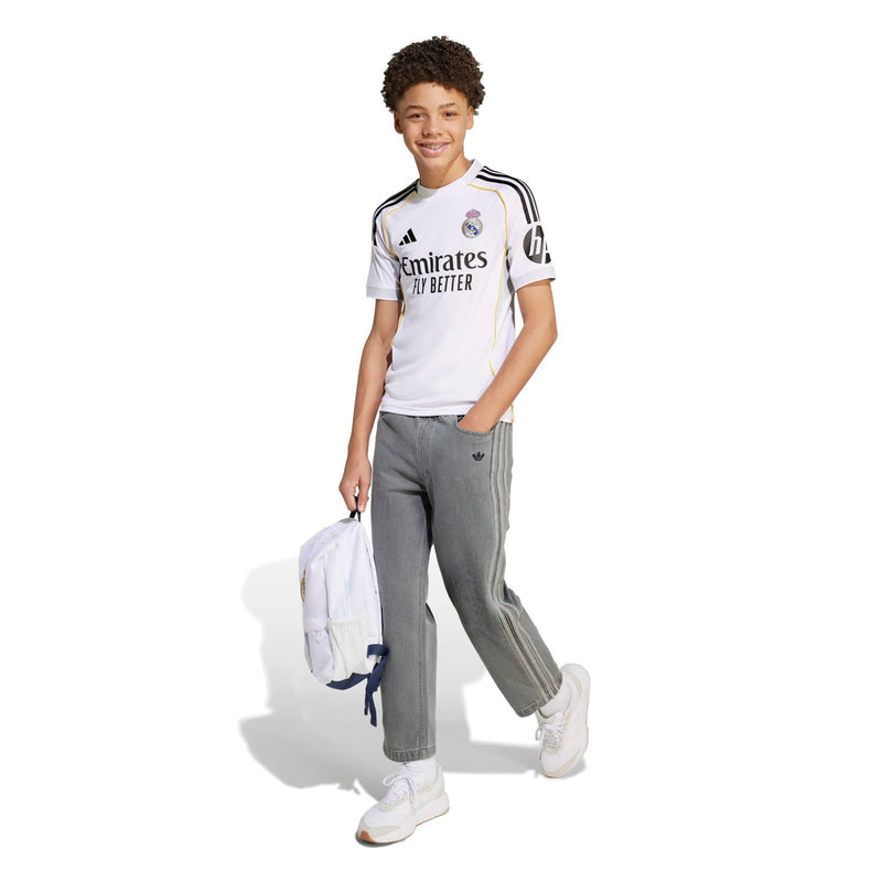 Youth Real Madrid home replica jersey, white with black-and-gold trim and Emirates logo