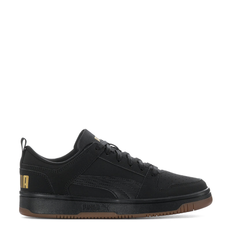Black youth low-top sneaker, lace-up, gum-brown outsole, gold logo detail