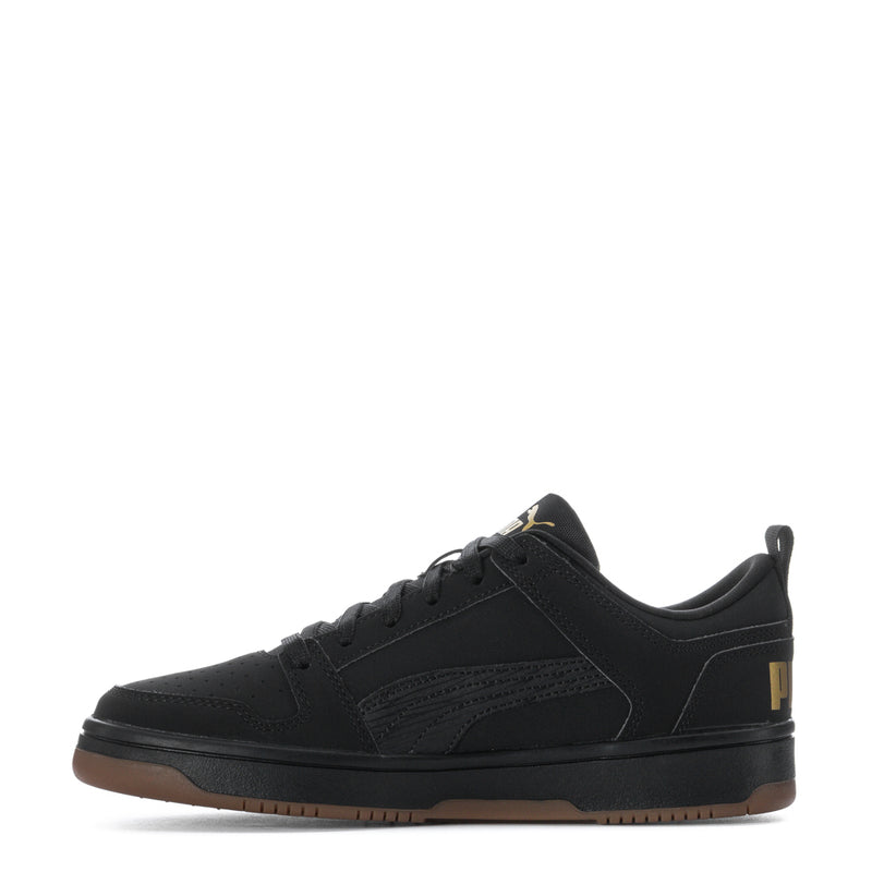 Black youth low-top sneaker with lace-up, side panel texture, gum-brown outsole
