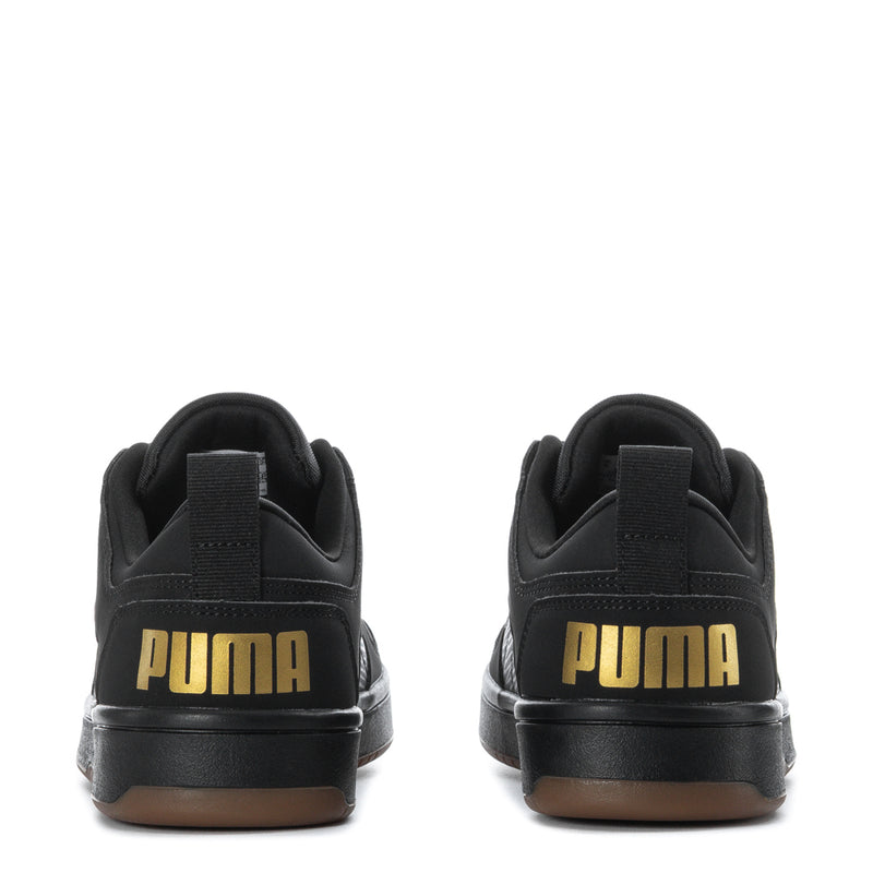 Black youth low-top sneakers, heel view with PUMA branding and gum-brown sole